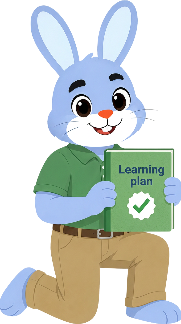 Frank kneeling and holding up a green learning plan notebook